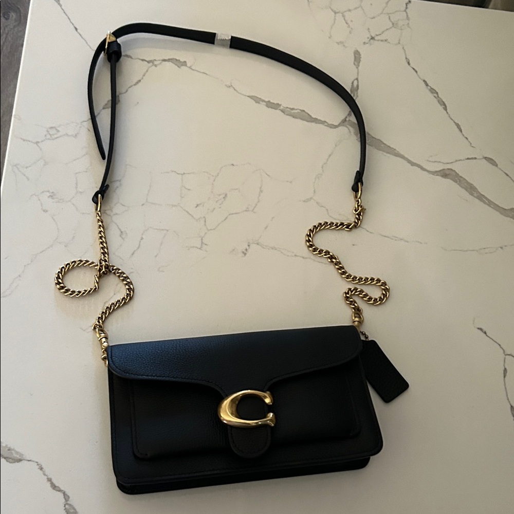 Black Leather Shoulder Bag with Gold Accents